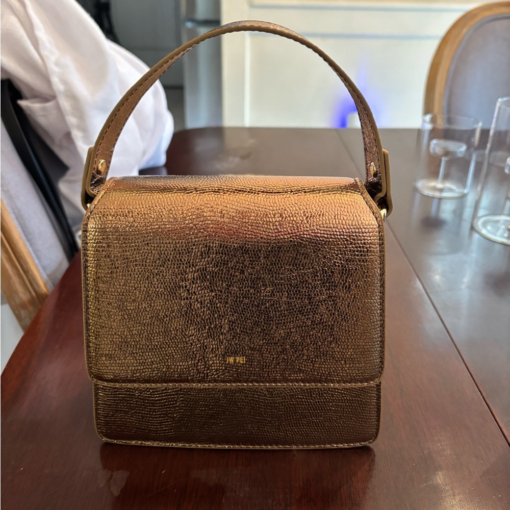 JW Pei gold purse